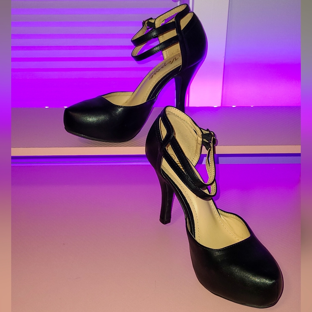 Black platform pumps
